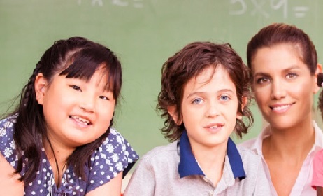 Multi ethic primary school classroom with teacher