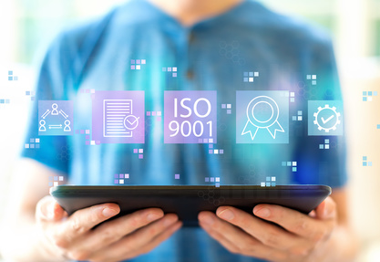ISO 9001 with man using a tablet
