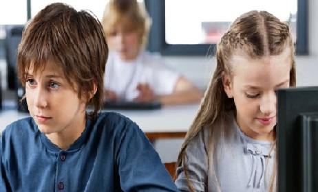 Schoolchildren Using Desktop Pc In Computer Lab